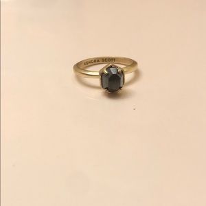 Black stone and gold ring